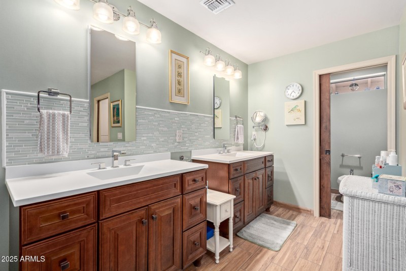 Primary bath separate vanities.