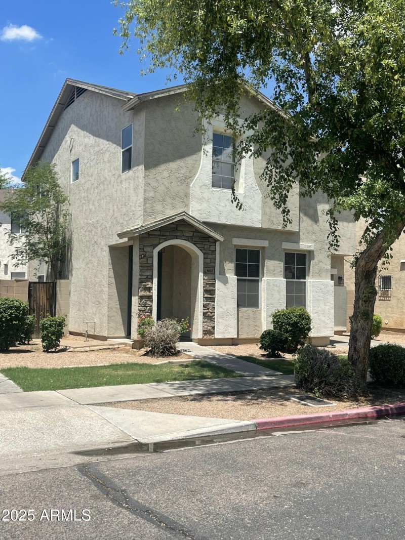 Front of home and side gate