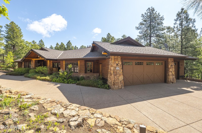 Front of house with side entry garage