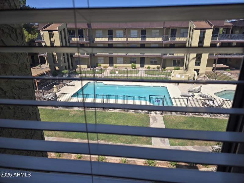 BEDROOM WINDOW OVERLOOKS COMMUNITY POOL