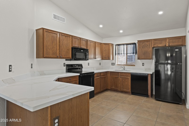 Kitchen with Fresh Stained Cabs and New