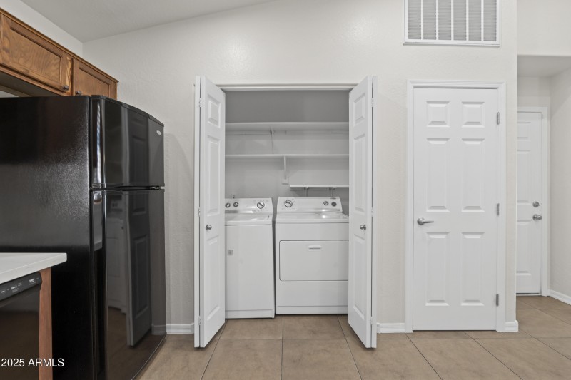Laundry Closet with Shelving