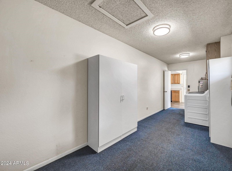 Large inside Laundry and storage room -