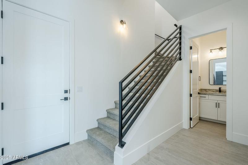 Stairs to upstairs bonus room