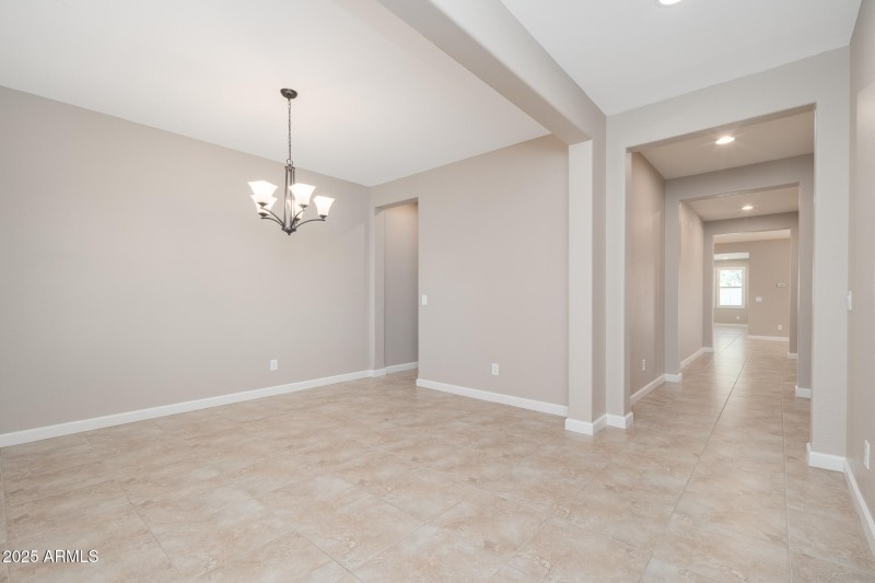 FOYER INTO FORMAL DINING ROOM