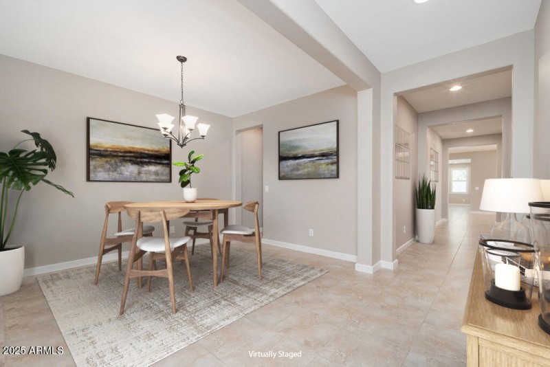 FOYER INTO FORMAL DINING ROOM
