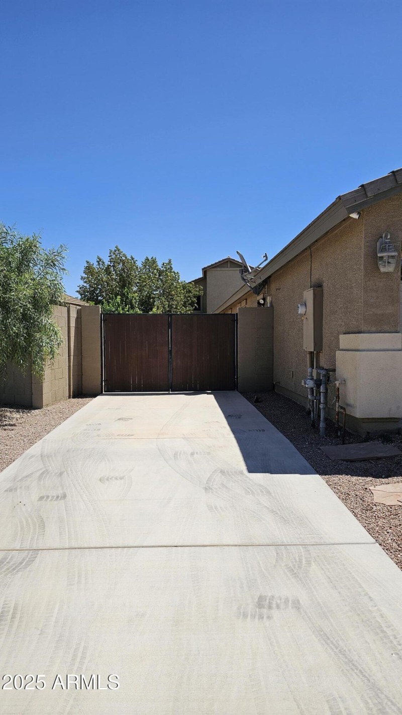 Paved driveway to and past the RV Gate