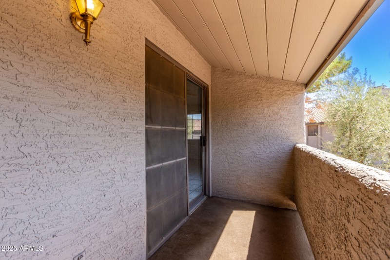 Large covered east side patio
