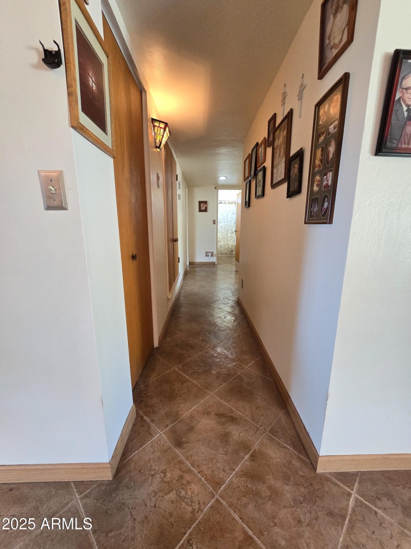 Hall to the bedrooms and bath