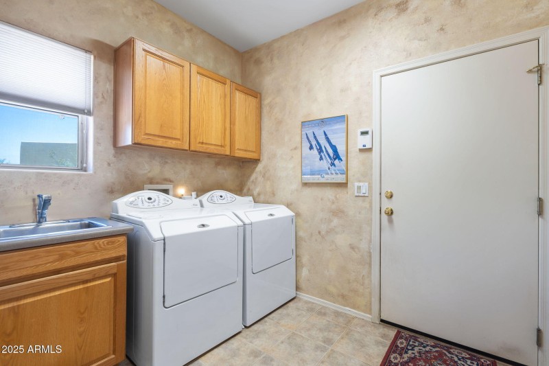 Laundry room with sink