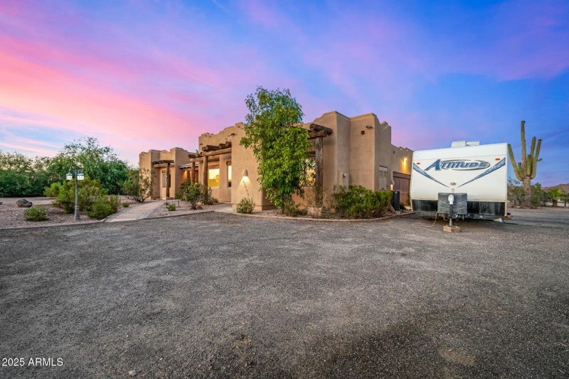 HUGE PARKING AREA WITH ROOM FOR RV