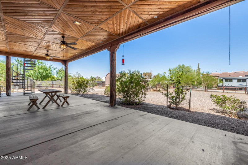 NEARLY FULL LENGTH COVERED BACK PATIO (1
