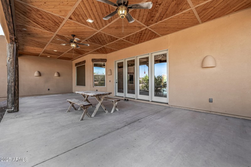 NEARLY FULL LENGTH COVERED BACK PATIO (2