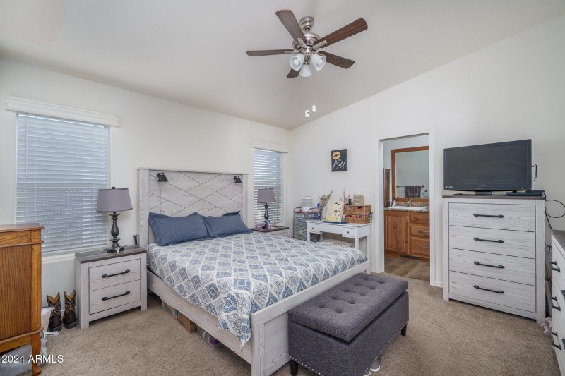 11) PRIMARY BEDROOM