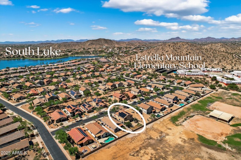 Drone view of house, elementary school &