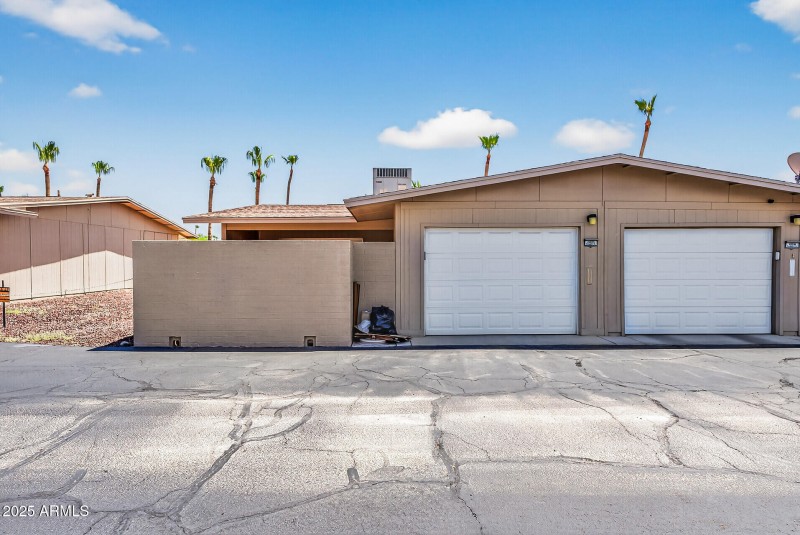 Garage & Back Wall of Patio