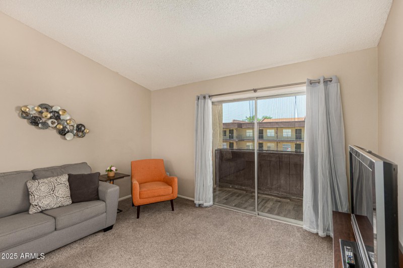 BALCONY OVERLOOKING THE COMMUNITY POOL