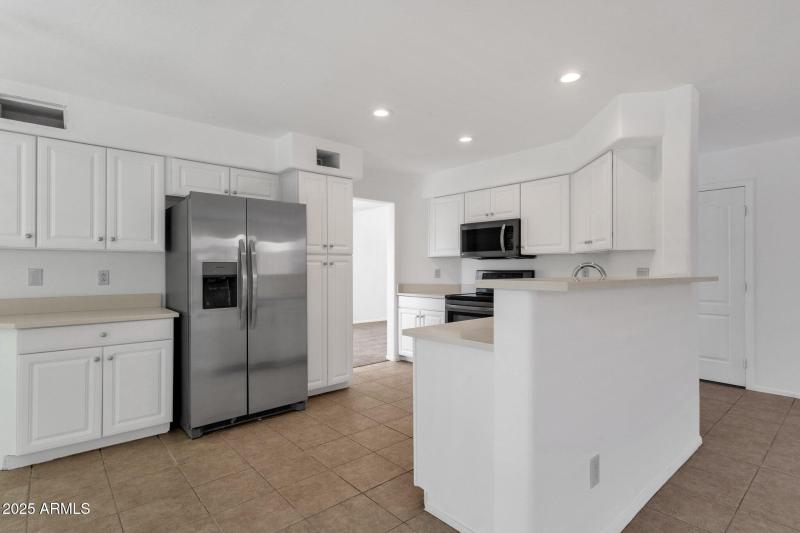 Ample Cabinetry + Kitchen Bar Counter