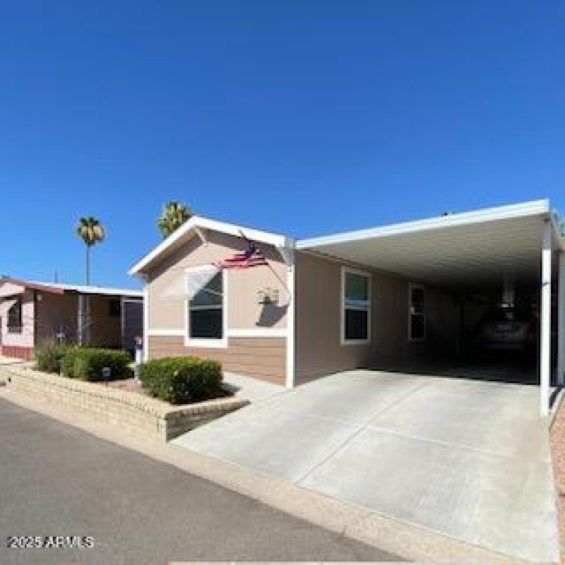 Front with large carport