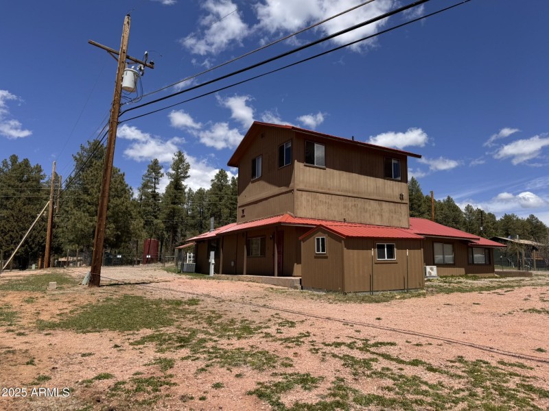 7 - Main house west side & storage shed