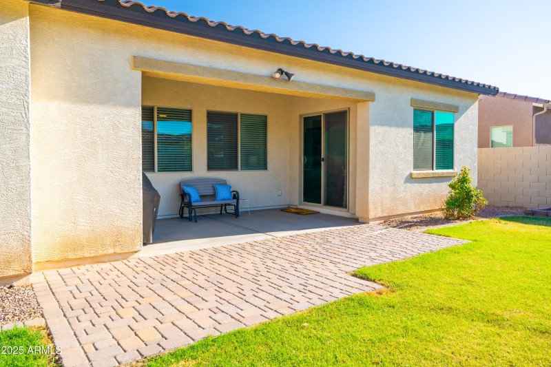 large covered patio & extended pavers