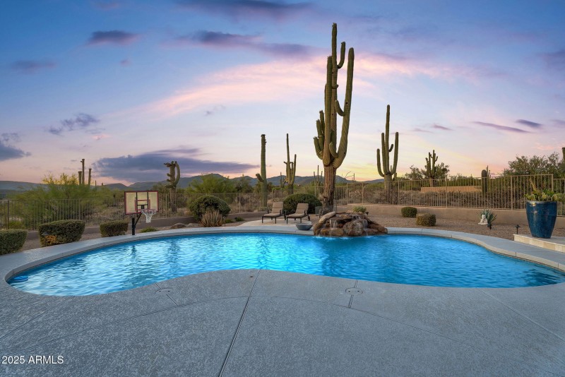 Large heated pool w/ waterfall