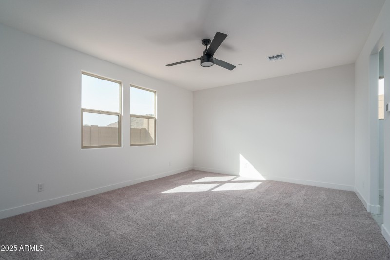 8) PRIMARY BEDROOM