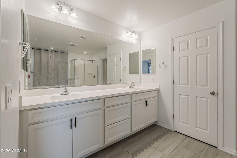 Dual Sinks & White Cabinetry