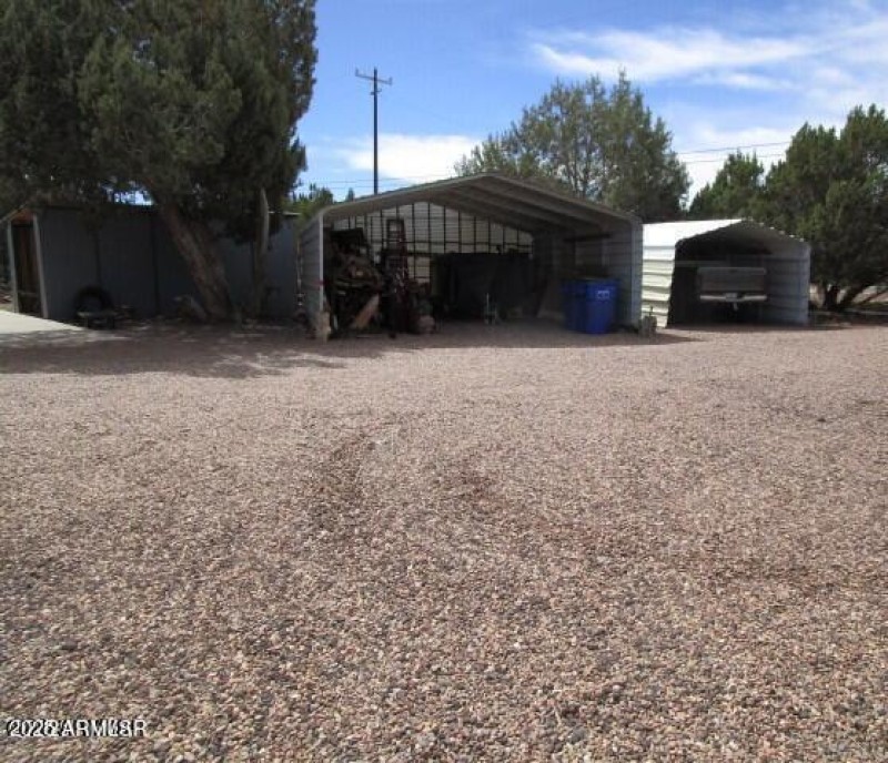 Two of the three carports