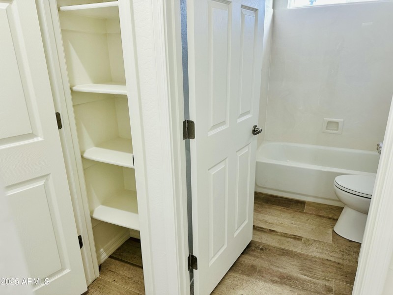 Hall with Closet and Bathroom
