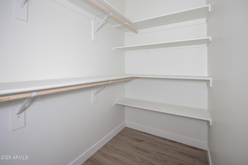 Guest Bedroom Closet (one in eac