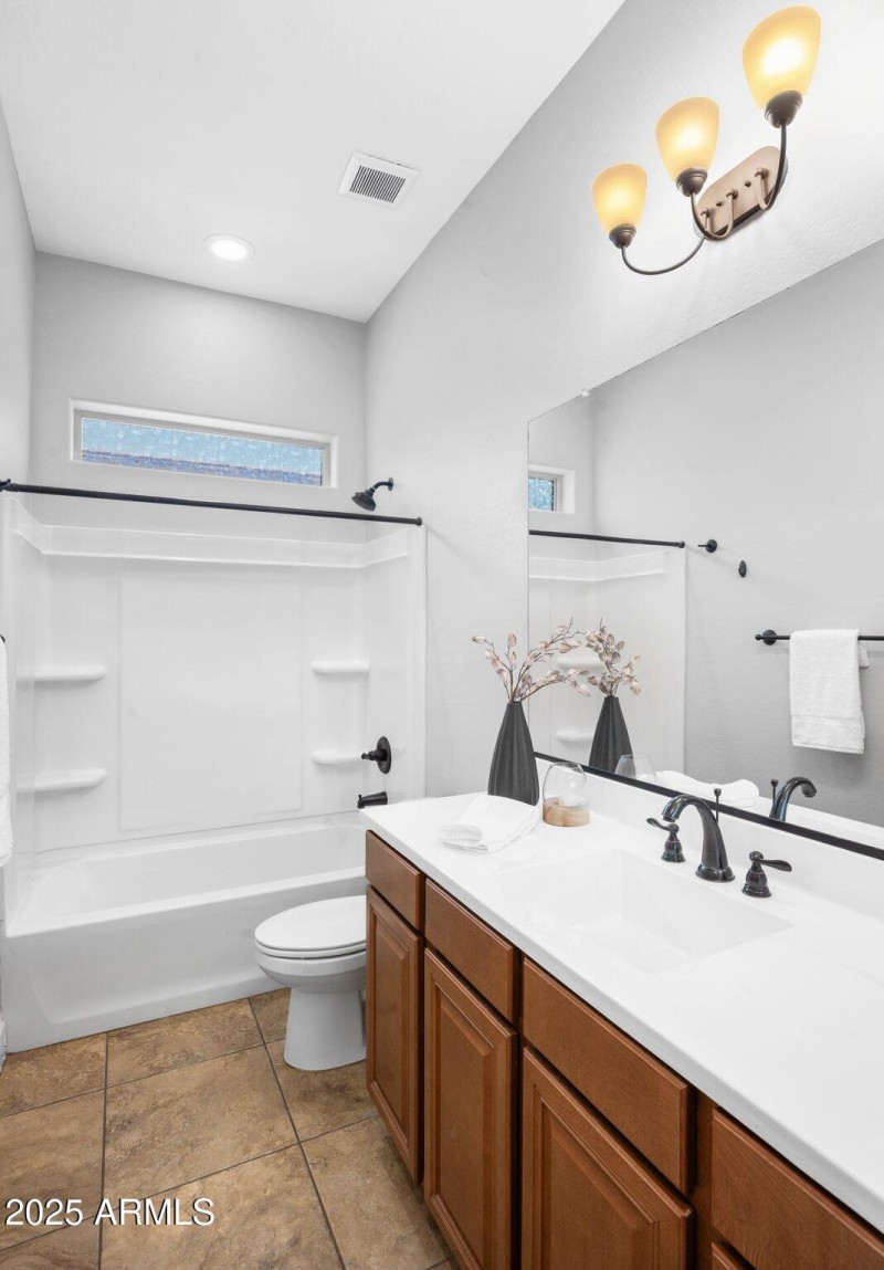 Sleek Bathroom with Dual Lighting