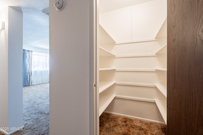 Walk-in Hall Linen Closet