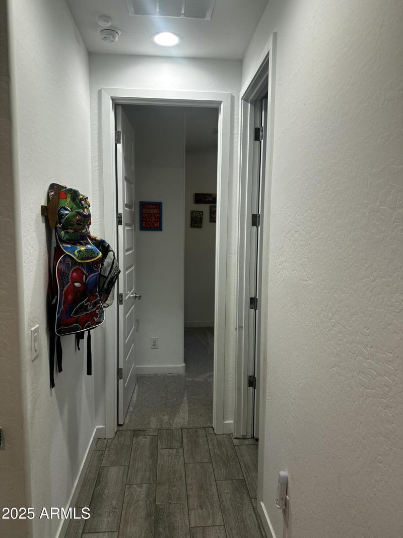 Hallway to secondary bedroom 3