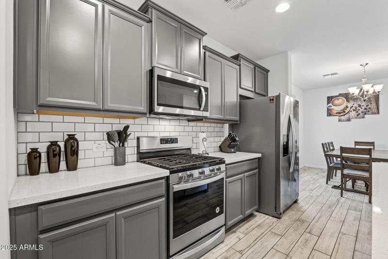 Gas Range & Custom Backsplash