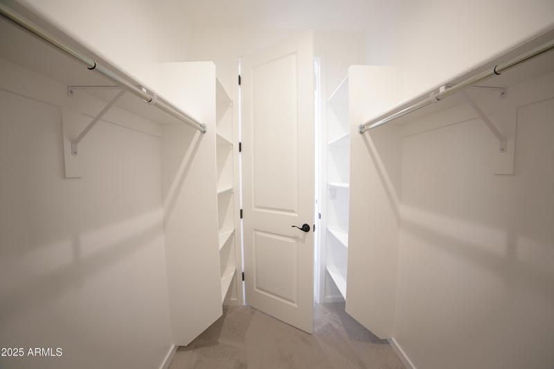 Primary Bedroom Closet 1