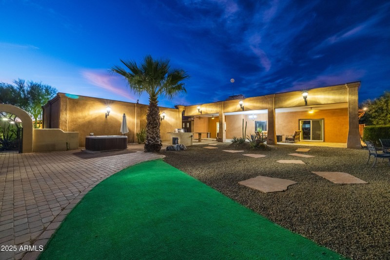 rear yard with hot tub