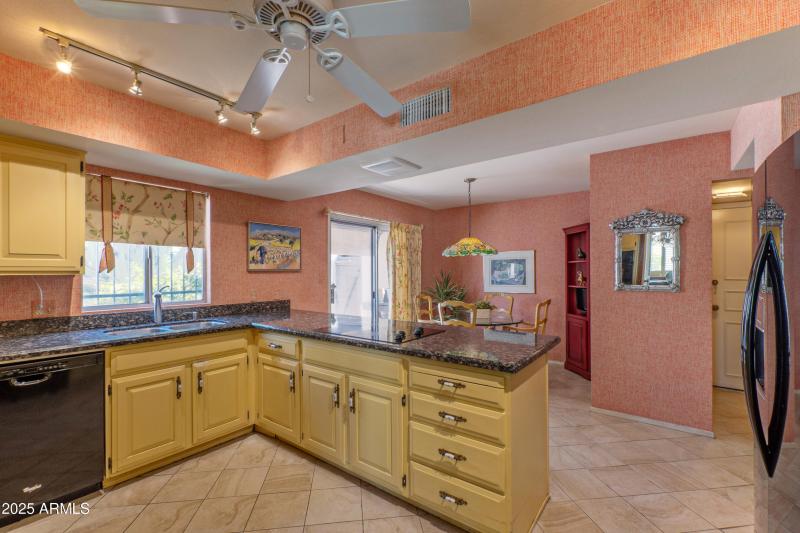 Kitchen open to sunning eating area