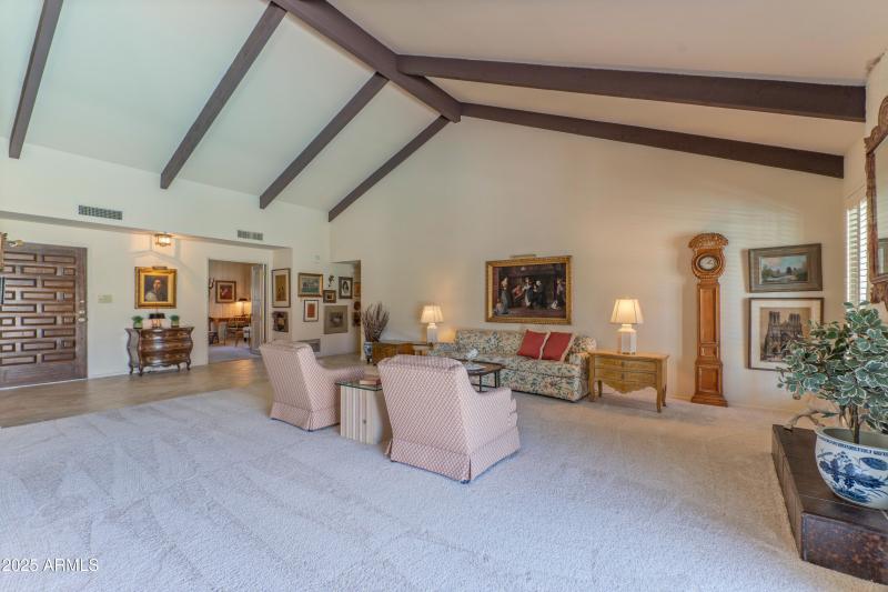Living room with beamed ceilings