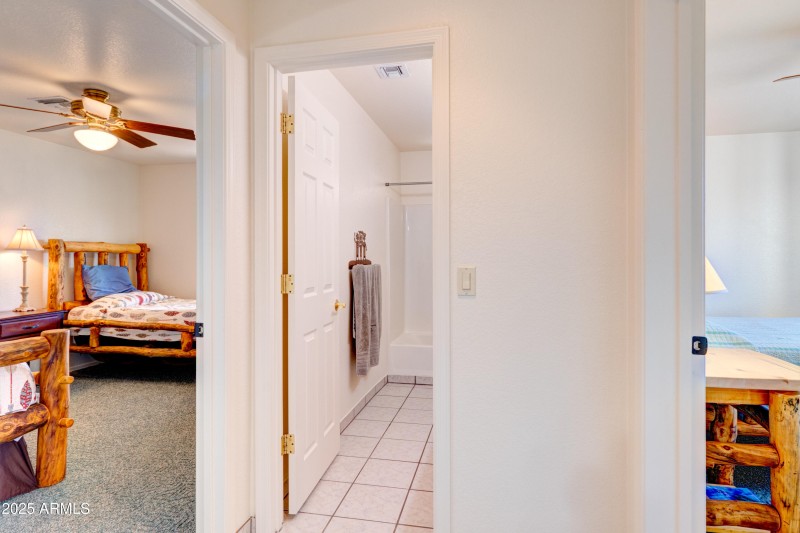 Hallway with Bathroom and Bedrooms