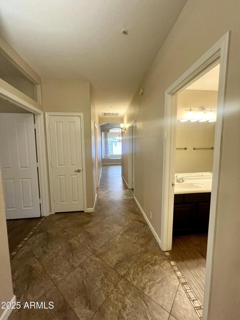 Hallway w/ Storage closets