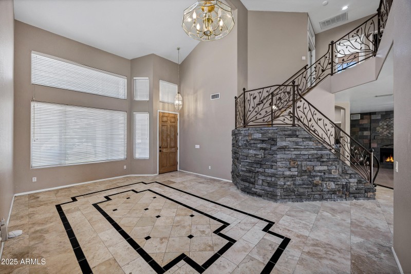 Stone Clad Staircase w/ Custom Railing