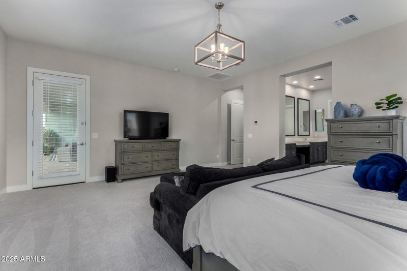 Primary suite w/private backyard access