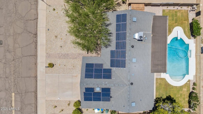 Aerial view OWNED solar and pool!