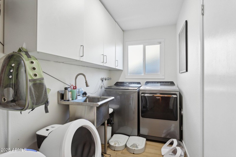 Large inside laundry room w/ basin sink