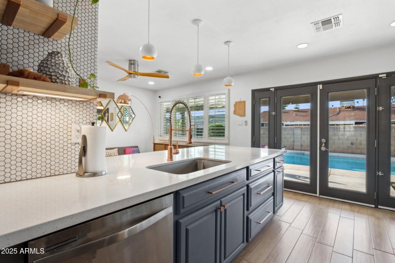 Kitchen opens to rear patio
