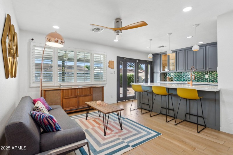 Living room opens to kitchen