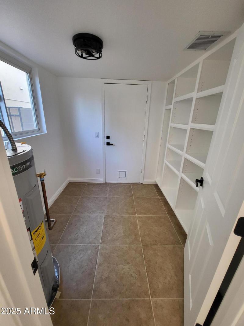 WALK IN PANTRY & ENTRY TO GARAGE