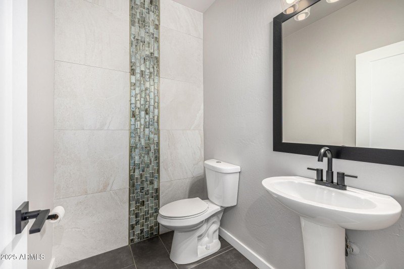 Stylish Powder Room with Accent Tile
