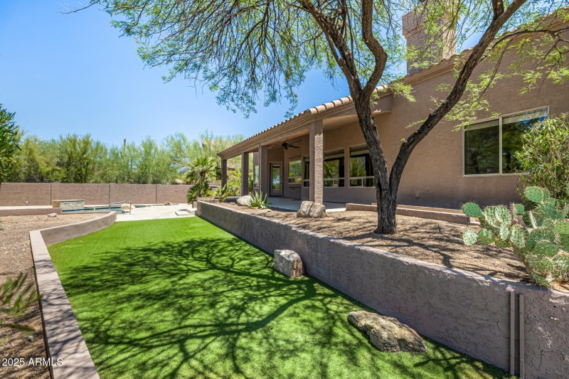 Shaded Yard With Covered Patio